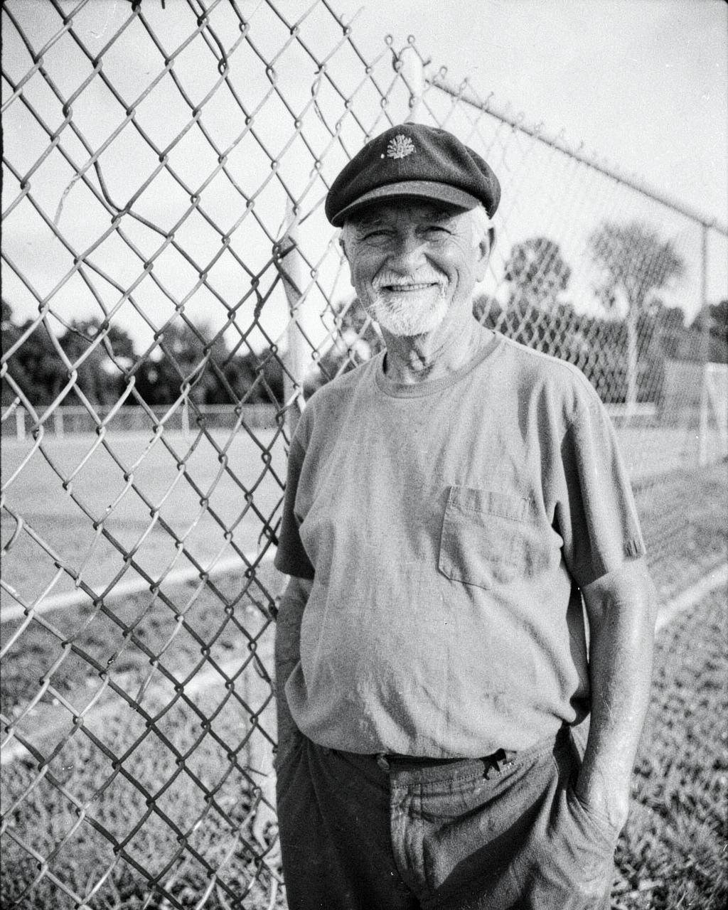 Archival portrait of Jim “Coach” Caudle at the ballfield